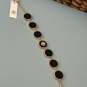 Tory Burch Gold and Black Medallion Panel Bracelet